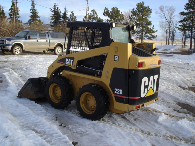 Cat 226 ROPS, Bucket, Forks