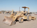 John Deere 210LE Skip Loader